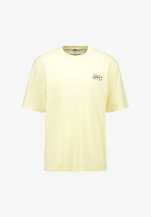 Gelbes Baumwoll-T-Shirt mit Rundhalsausschnitt, kurzen Ärmeln und einem kleinen Druckdesign auf der linken Brust. Weicher Stoff, lockere Passform.