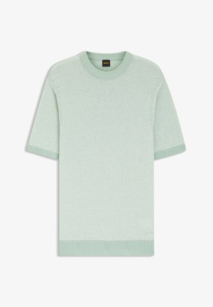 Hellgrüner, strukturierter Strickpullover mit kurzen Ärmeln, geripptem Rundhalsausschnitt, Ärmelbündchen und Saum, mit einem kleinen Markenetikett nahe am unteren Saum.