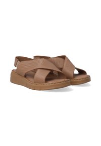Braune, durchbrochene Sandalen mit einem Design aus Kreuzriemen, gepolstertem Fußbett und dicker Gummisohle. Offene Zehen- und Fersenpartie.