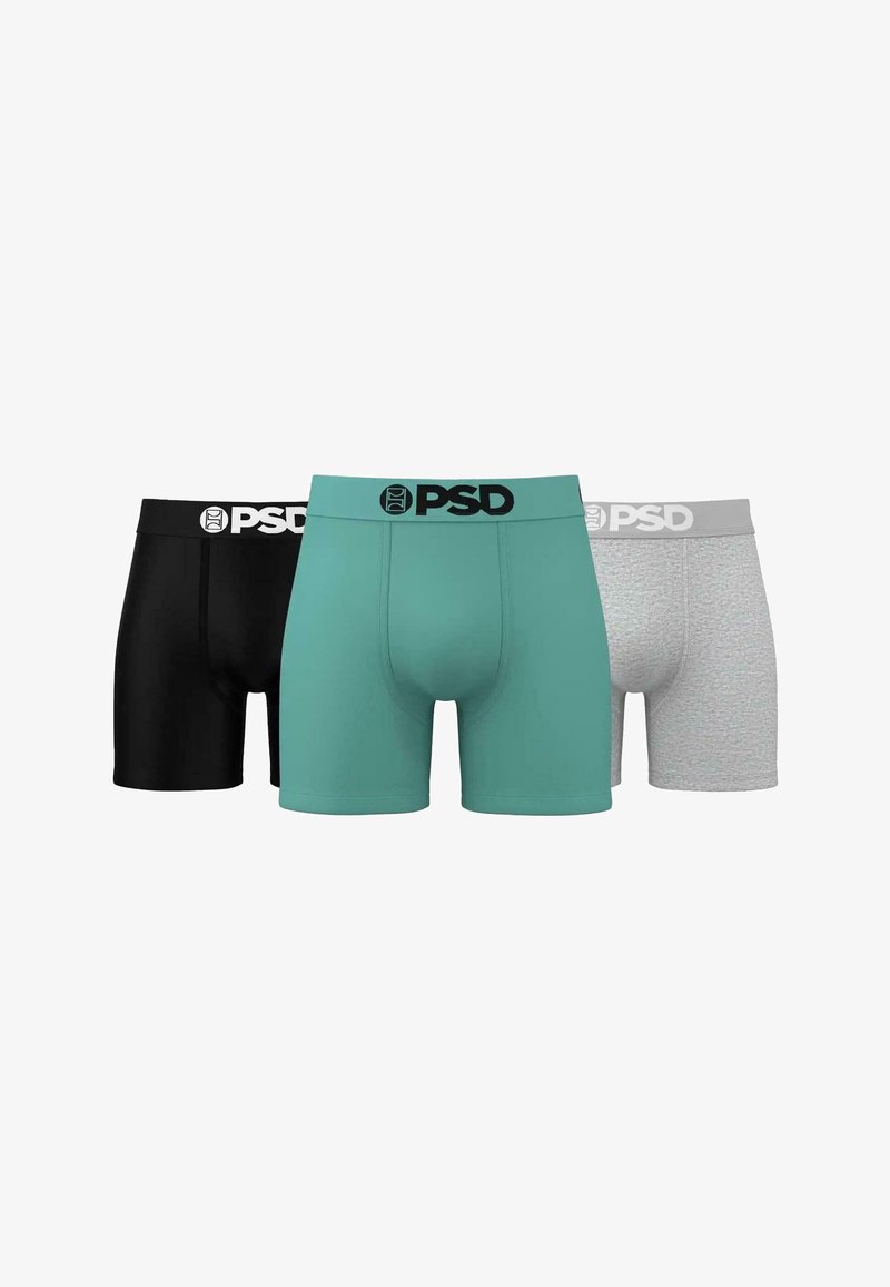 Trois paires de boxers pour hommes : noir, teal et gris clair. La paire teal présente une texture lisse, tandis que le gris a un motif subtil.