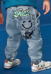 Next GRAFFITI - Laza szabású farmerek - light blue denim