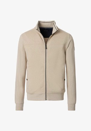 Beige ritsjack met een gestructureerd oppervlak, staande kraag en zwarte accenten. Voorzien van zijzakken en geribbelde manchetten aan de mouwen en onderkant.