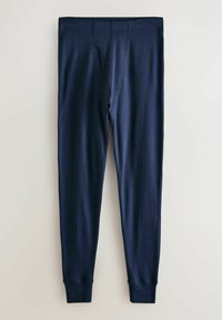 Tengerészkék hosszú leggings bordázott anyagból, gumis derékrésszel és szűkített szárvégekkel a bokánál. Nincsenek rajta feltűnő minták vagy díszítések.