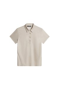 Polo shirt beige a maniche corte con un motivo testurizzato, colletto e quattro bottoni marroni sul davanti. Finitura in tessuto liscia.