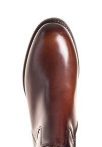 Brown leather boot with a smooth, polished surface, rounded toe, and subtle stitching detail along the seam and edge. Plain design.