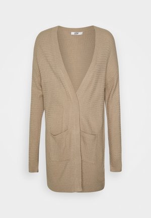 Cardigan en maille beige avec manches longues, deux poches avant, devant ouvert et bord côtelé le long des bords.
