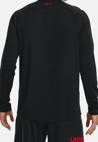 Under Armour Pitkähihainen paita - black