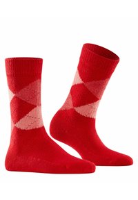 Calcetines de argyle en rojo y rosa claro con puños de canalé, material mezcla de algodón y una textura suave. Presentan una construcción de puntera sin costuras.