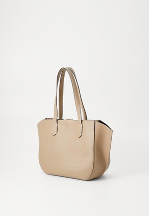 Beige leather tote bag with double shoulder straps and stitched rectangular pocket detail on a plain background.