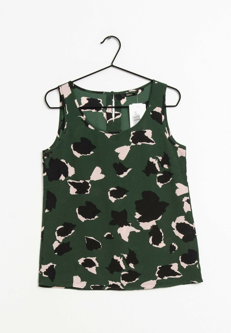 Ärmlös grön blommig topp med ett abstrakt mönster i svart och blekrosa, tillverkad av lättviktig tyg, hängande på en svart galge.