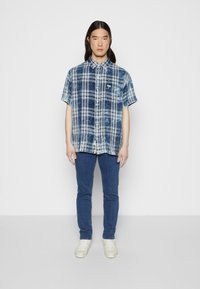 Lee RIDER - Calças de ganga justas - mid stone wash