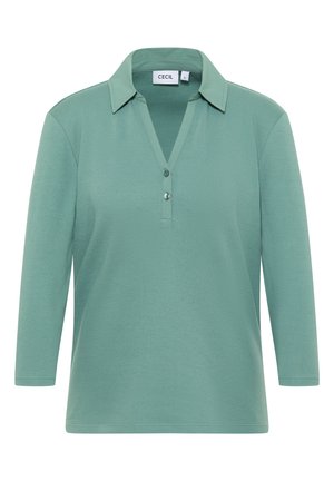 Lichtgroene longsleeve polo met een kraag, voorzien van een knoopsluiting en een zachte textuur. Casual ontwerp, effen kleur zonder patronen.