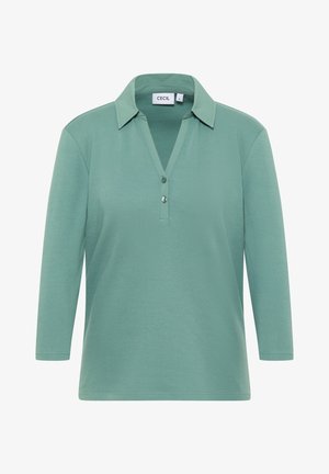 Lichtgroene longsleeve polo met een kraag, voorzien van een knoopsluiting en een zachte textuur. Casual ontwerp, effen kleur zonder patronen.