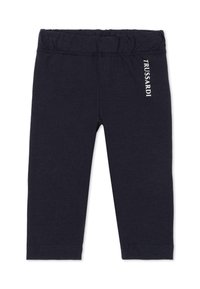 Granatowe legginsy wykonane z miękkiej bawełny, z elastycznym paskiem w talii i nadrukowanym logo po boku. Gładka faktura, bez widocznych wzorów.
