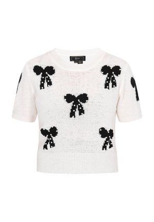 White short-sleeve sweater featuring a knitted pattern of black bows with decorative pearl accents, ribbed neckline and bottom hem.