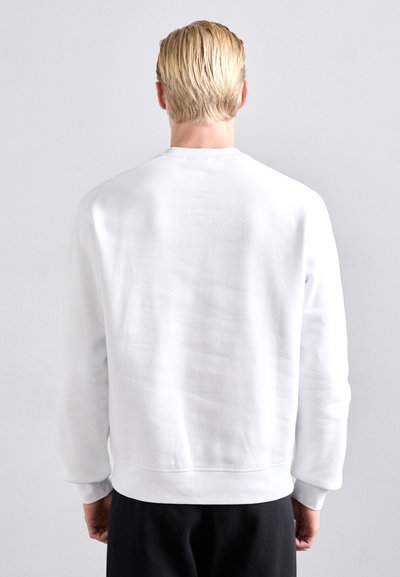 White sweatshirt with crew neckline and ribbed cuffs, made of soft cotton blend, featuring a smooth texture and no visible patterns.