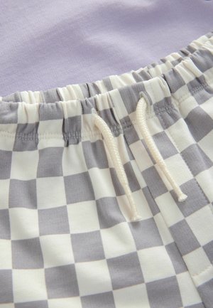 Ruuduline halli ja valget kangas beežika paelaga, selle kohal on ühtlane lavendlivärv; reguleeritava sobivuse tagamiseks on elastne vöökoht.