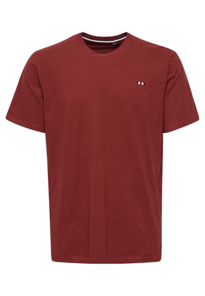 Red cotton T-shirt with a round neck and short sleeves, featuring a small multicolored logo detail on the left chest area.