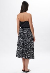 Maison Form'elle FLORAL - Gonna a campana - black