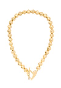 Złota naszyjnik z koralikami w nieregularnych okrągłych kształtach, z zapięciem na zatrzask w kształcie serca.