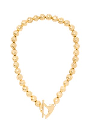 Złota naszyjnik z koralikami w nieregularnych okrągłych kształtach, z zapięciem na zatrzask w kształcie serca.