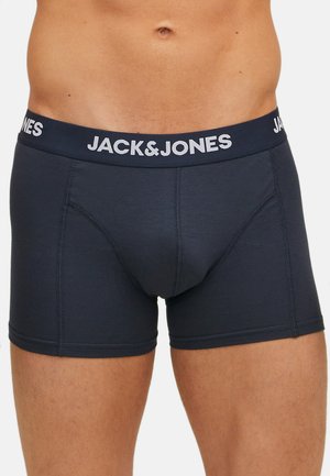 Navyblaue Boxershorts mit einem weichen elastischen Bund, der das „JACK&JONES“-Logo in Weiß trägt. Enganliegendes Design mit flachen Nähten für zusätzlichen Komfort.