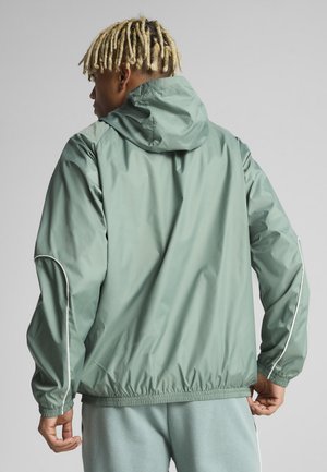 SPORT  - Veste coupe-vent - green moon