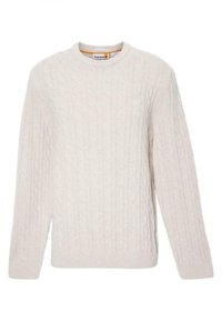 Pull en maille torsadée de couleur crème avec manches longues et encolure ronde, présentant un motif texturé subtil.