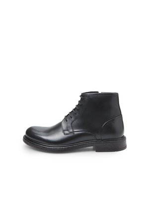 Black leather ankle boot with round toe, six eyelet lace-up design, smooth texture, and stacked heel for stability.