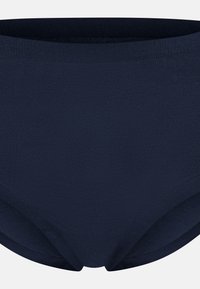 Marinblå högmidjade trosor i mjukt, elastiskt tyg med en slät yta och utan synliga sömmar, vilket ger en säker passform.