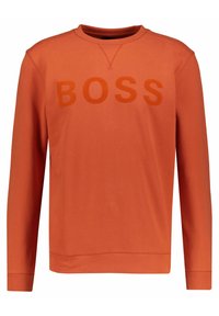 Sudadera naranja de manga larga, con un logo tonal "BOSS" en el frente. Está hecha de un tejido suave, tiene un cuello redondo y puños acanalados.
