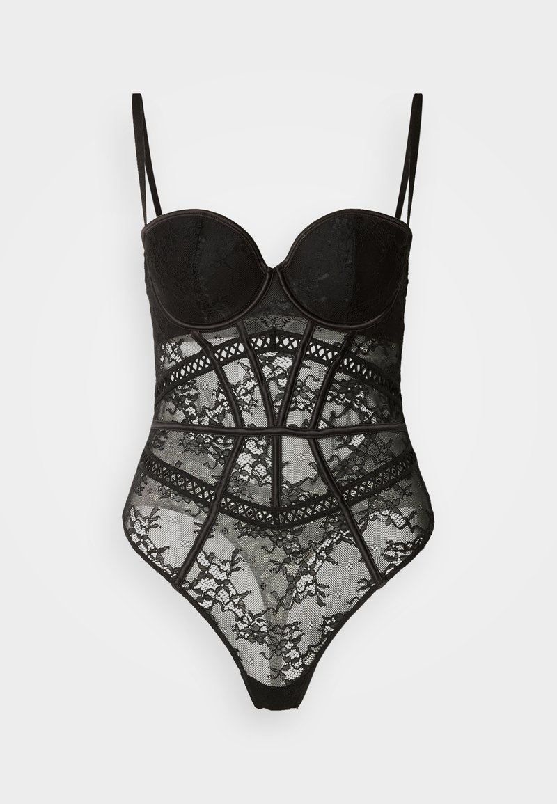 Μαύρο κορμάκι με δομημένο σχέδιο από δαντέλα, μπανέλες, ρυθμιζόμενους ιμάντες και διαφανές κάτω μέρος από δίχτυ με περίτεχνα μοτίβα.