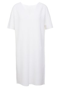 Robe blanche à manches courtes avec un décolleté en V, fabriquée dans un tissu texturé. Le design est ample avec une silhouette droite.