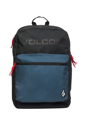 Sac à dos Volcom noir et bleu avec une poche zippée à l'avant, des tirettes rouges, une poignée supérieure et le logo Volcom en bas à droite.