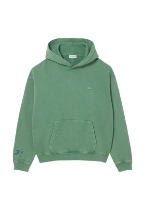 Felpa verde con cappuccio realizzata in morbido cotone. Dotata di una tasca frontale, polsini a coste e un piccolo logo Lacoste sul petto.