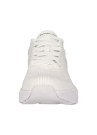 White athletic sneaker with a mesh upper, textured surface, lace-up design, and a cushioned sole. Features branding on the tongue.
