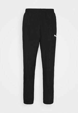 Black athletic pants made of lightweight fabric, featuring an elastic waistband and a white Puma logo on the left thigh. Straight-leg design.