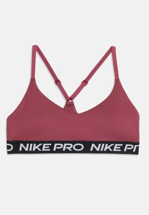 Brassière de sport mauve avec fines bretelles ajustables et bande élastique noire avec le logo Nike Pro blanc.