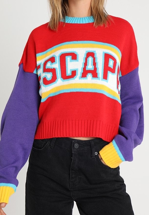 Red and purple knitted sweater with a wide fit, featuring a prominent "ESCAPE" design in bold letters and multi-colored stripes on the hem.