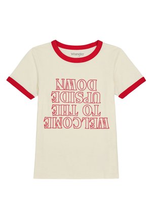 Cream-colored t-shirt with red ringer collar and sleeves. Features upside-down text: "WELCOME TO THE UPSIDE DOWN" in bold red font.