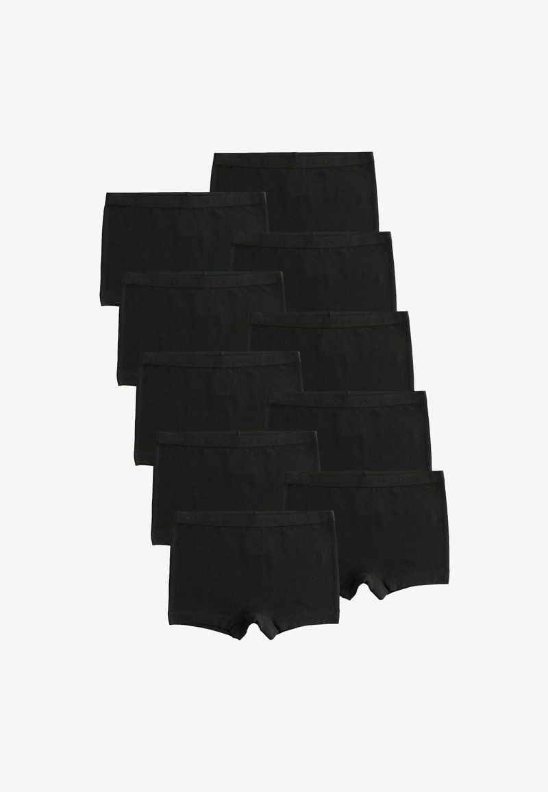 Dix paires de boxers noirs unis empilés en arrangement superposé sur fond blanc.