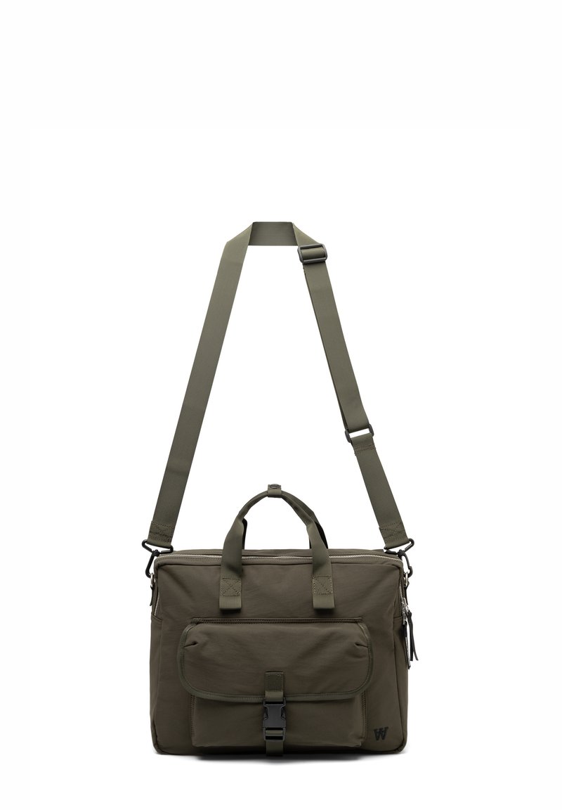 Olivroheline kott, millel on ristkülikuline kuju, tõmblukuga ülemine osa, kaks käepideme, reguleeritav rihm ja esikott klambri sulgemisega. Matt tekstuur.