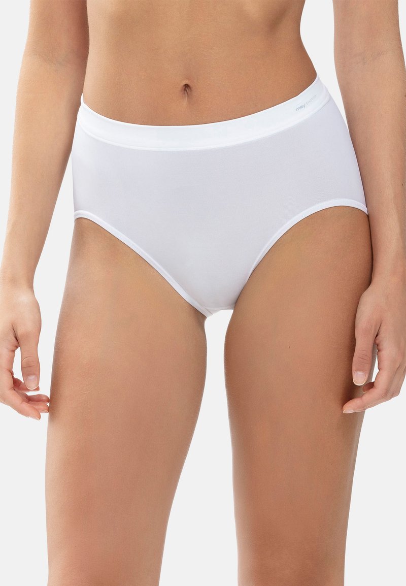 Panties bianchi a vita alta realizzate in tessuto morbido, con un elastico in vita e bordi senza cuciture per il massimo comfort. Senza motivi o dettagli visibili.