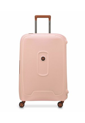 Pink hard-shell suitcase with a textured surface, a central lock, brown handle, and four multi-directional wheels for easy mobility.