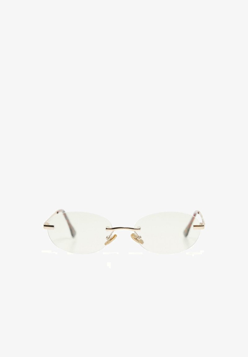 Okrogla očala brez okvirja z zlatim mostičkom in blazinicami za nos, tankimi zlatimi strančnicami ter prozornimi lečami na belem ozadju.