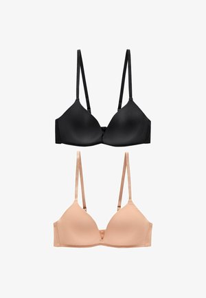 Sorte og nude bh'er med formede skåle, justerbare stropper og glat tekstur. Begge har et sømløst design og hægteklap bagpå.