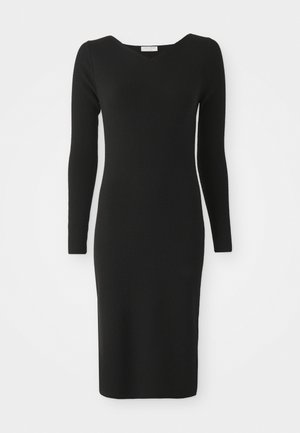 Black ribbed knit dress with a fitted silhouette, long sleeves, and a V-neck design, smooth texture, knee-length, minimalist style.