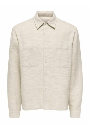 Bézs hosszú ujjú, gombos ing két elülső mellzsebbel és texturált anyagú kivitelben.