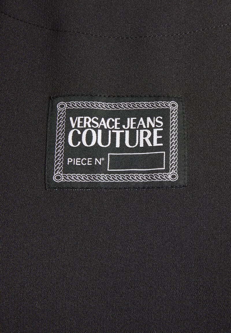 Damen Freizeitkleider | Versace Jeans Couture CADY Freizeitkleid black/schwarz - KS36833 Damen Freizeitkleider | Versace Jeans Couture CADY Freizeitkleid black/schwarz - KS36833