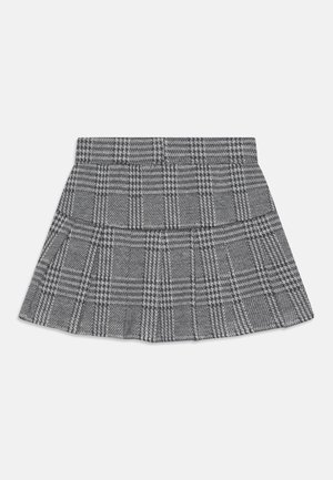 Jupe plissée à carreaux gris et noir avec une taille haute, présentée à plat sur fond blanc.